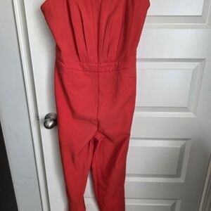 Adelyn Rae Vibrant Reddish Orange Corset Top Jumpsuit